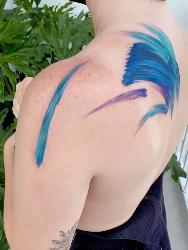 female color watercolor 纹身 在 back #56801 | 纹身师 Aleksandra Stojanoska