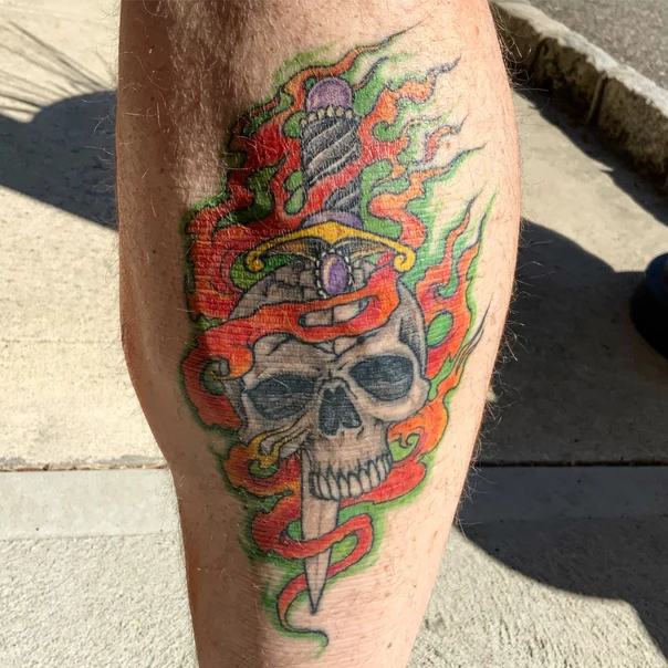 New School Skull, Dagger tattoo on Calf