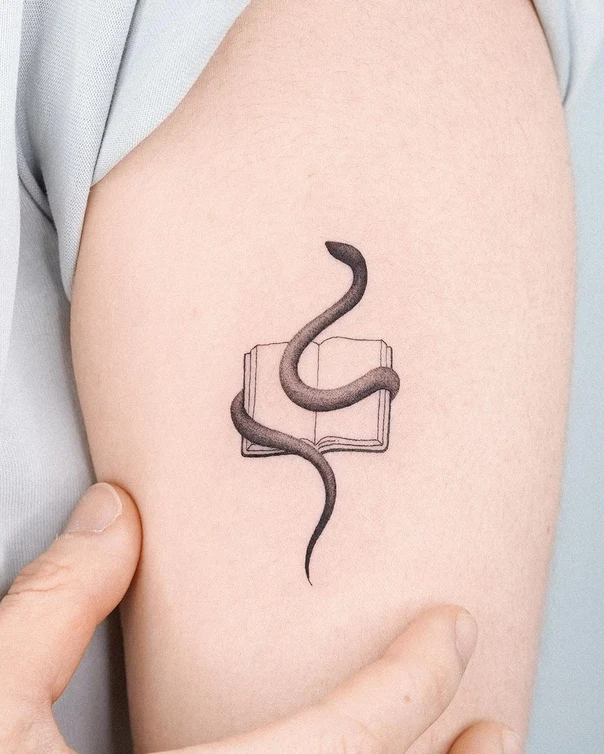 Linework Snake, Book tattoo on Upper Arm