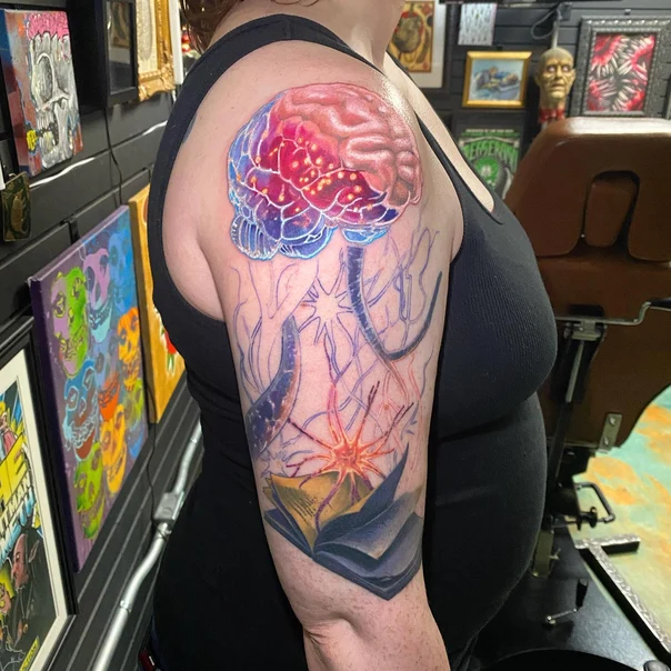 Illustrative Brain, Book tattoo on Upper Arm