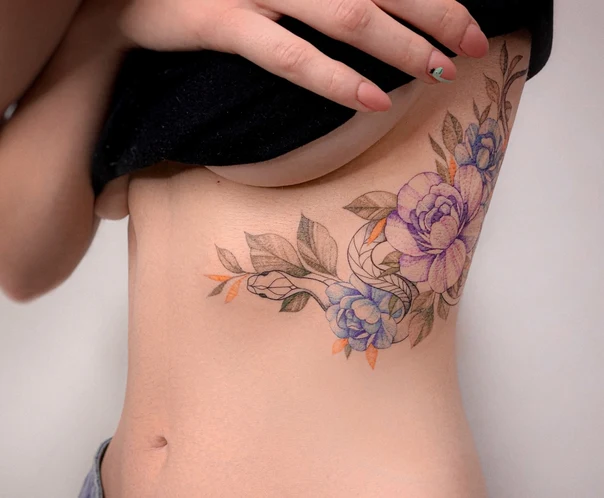Illustrative Flowers, Snake tattoo on Ribcage