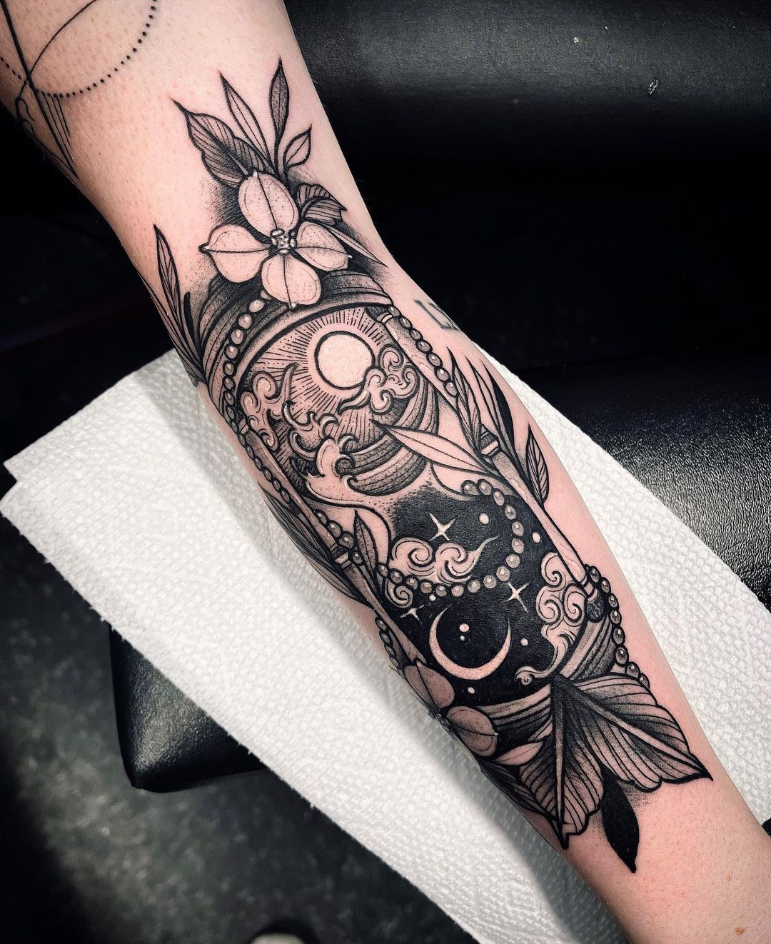 Black and grey style sleeve tattoo