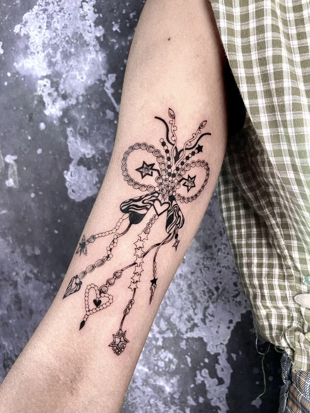 Linework Bow, Stars tattoo on Forearm