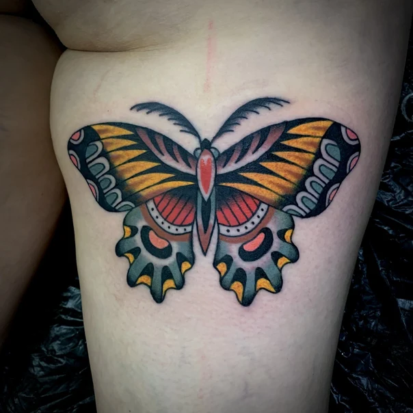 Traditional Butterfly tattoo on Thigh