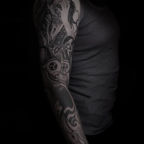 Graphic tattoo by baaad.ink in Moscow