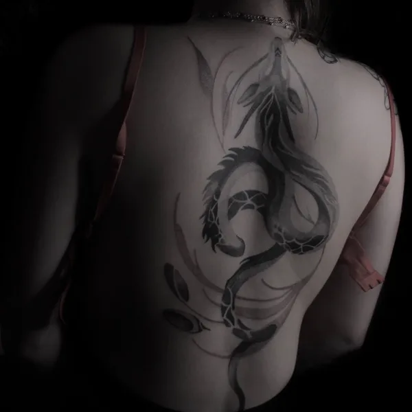Graphic tattoo by baaad.ink in Moscow