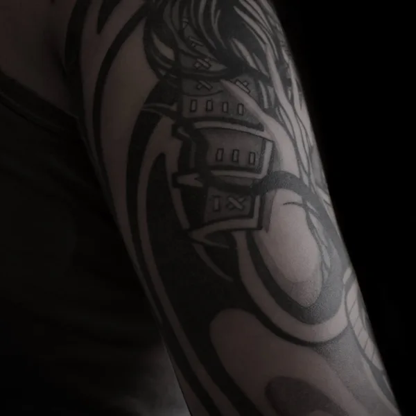 Graphic tattoo by baaad.ink in Moscow