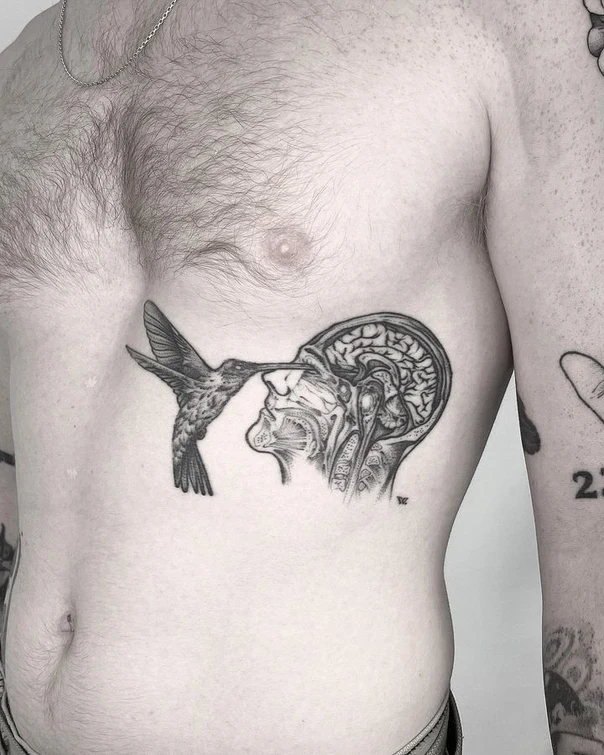 Black & Grey Hummingbird, Brain tattoo on Ribcage