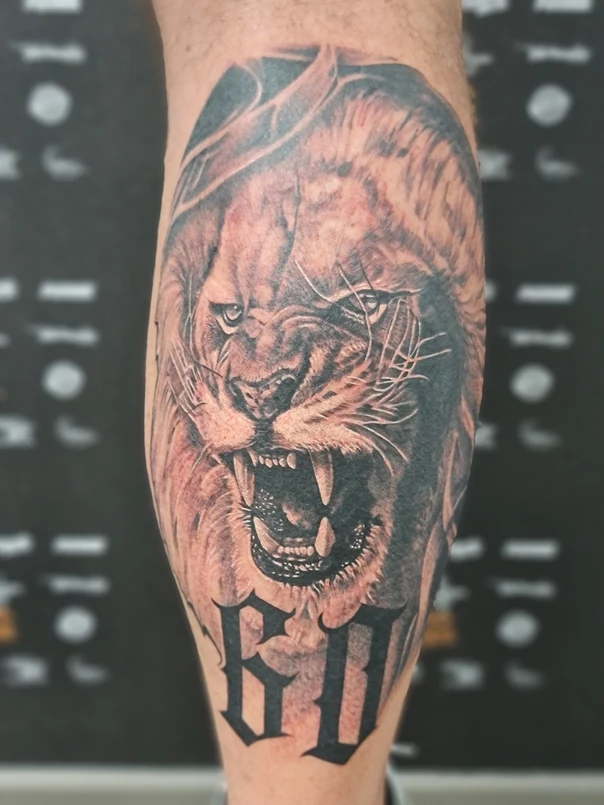 Realism Lion, Lettering tattoo on Calf
