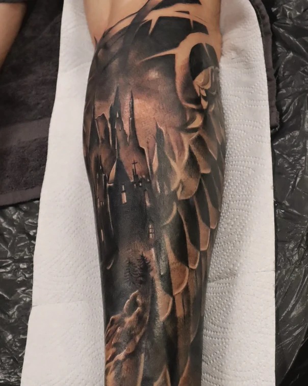 Realism Castle, Wings tattoo on Calf