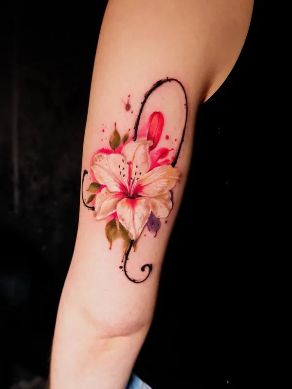female color watercolor tatuaje en outer arm #72695 | Tatuador Diana Ivashkevich