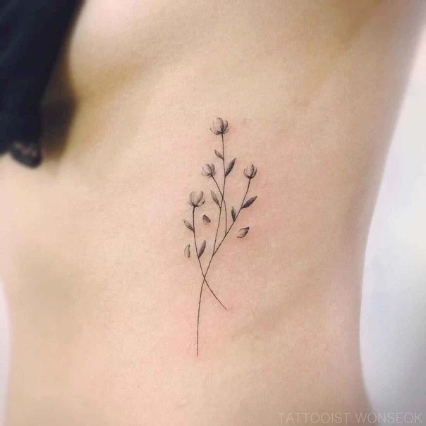 Fineline Flower, Plant tattoo on Ribcage