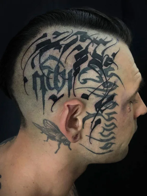 male black calligraphy Tatuagem em face #23605 | Tatuador Gordon Lettuce