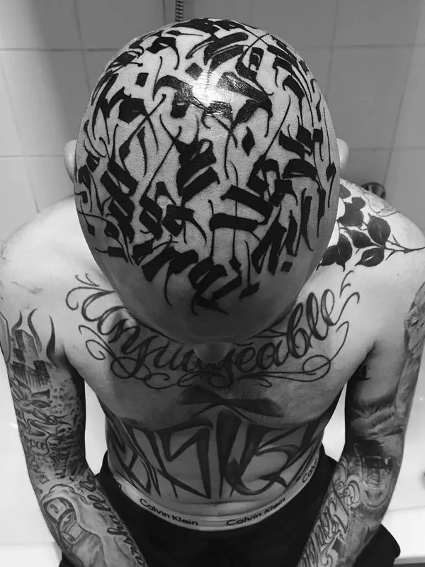 male black calligraphy Tatuagem em head #23607 | Tatuador Gordon Lettuce