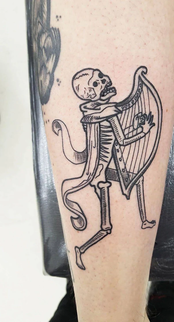 Linework Skeleton, Harp tattoo on Calf