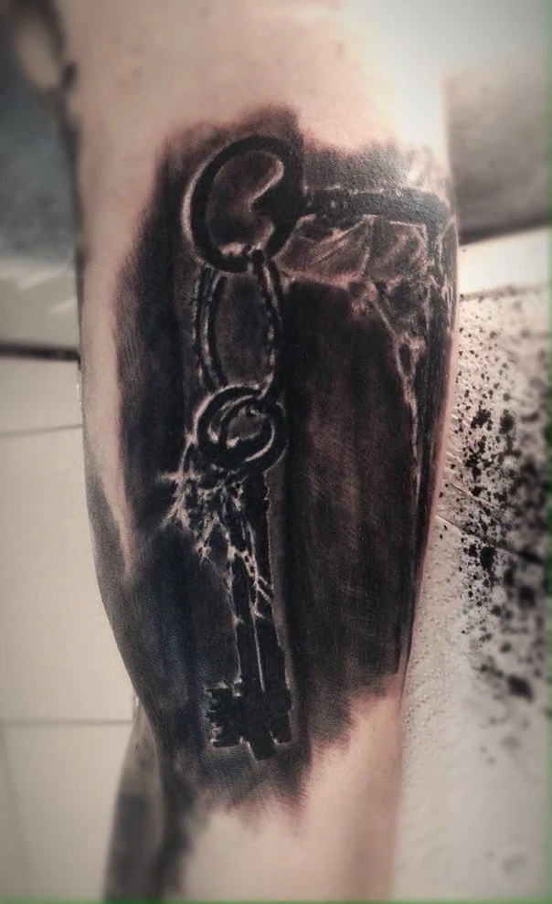 Чёрно-серая Key tattoo на Предплечье