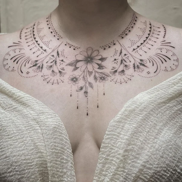 Ornamental Flower, Floral tattoo on Sternum