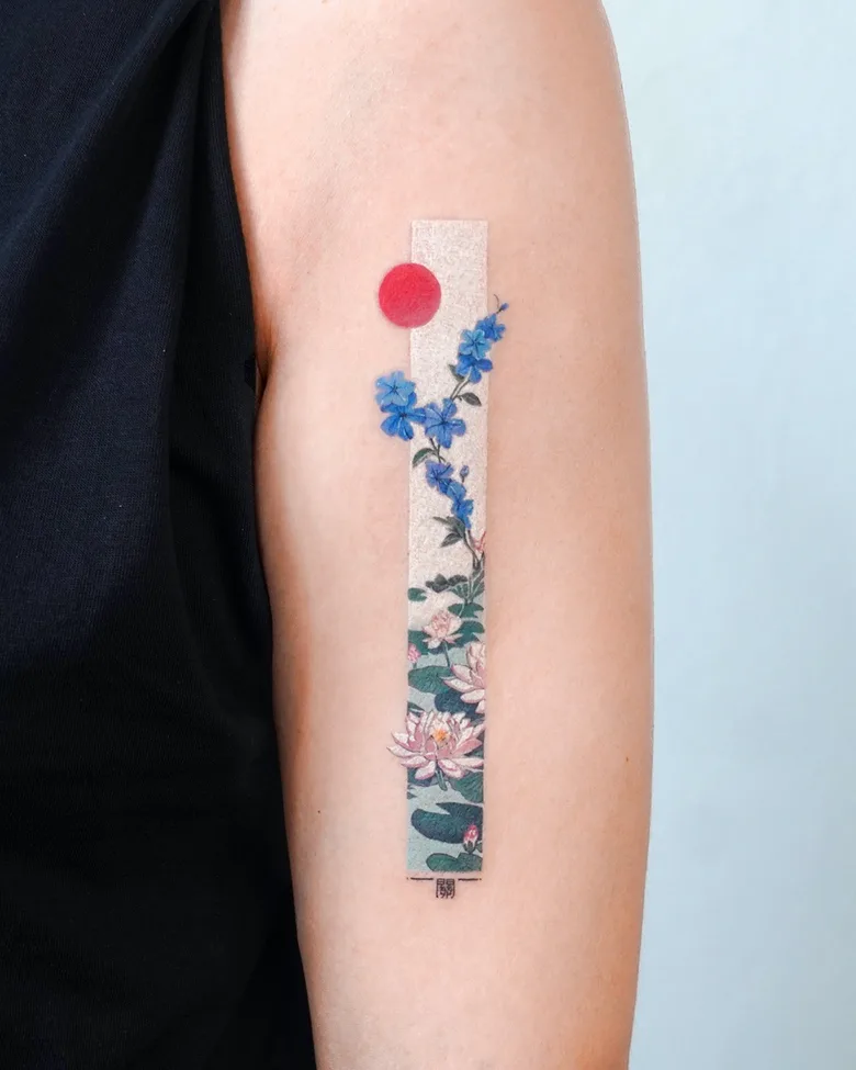 A vertical strip tattoo featuring a red sun at the top, with water lilies and flowers arranged below in a Japanese-inspired style.