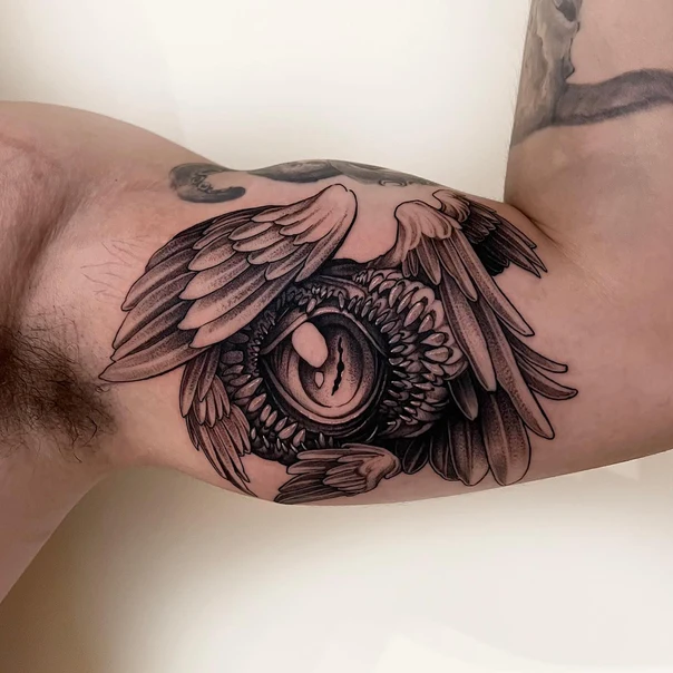 Black & Grey Eye, Wings tattoo on Bicep