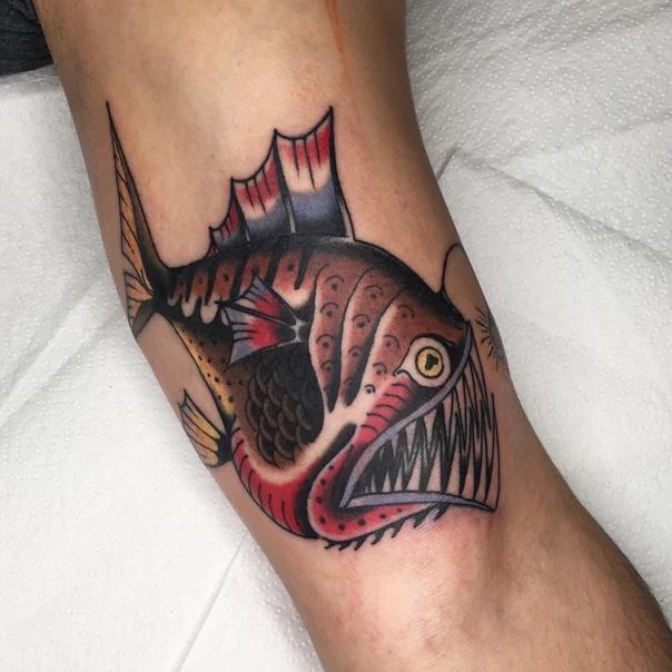 Traditional Fish tattoo on Forearm