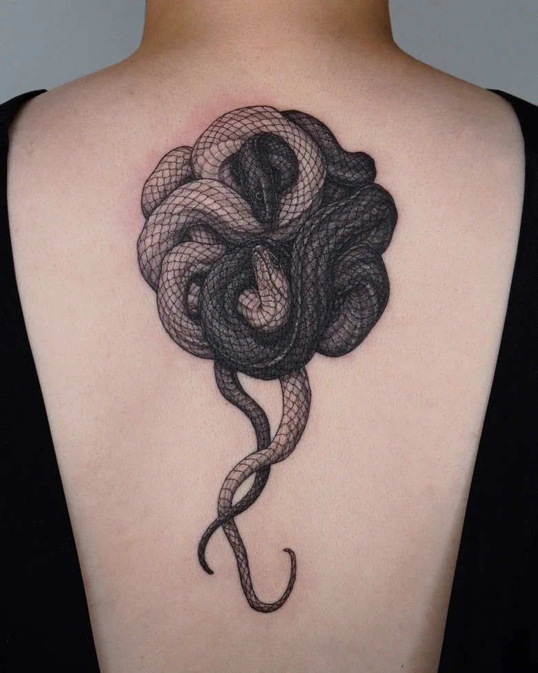 Tatuaggio di serpenti - Tatuatore Intat