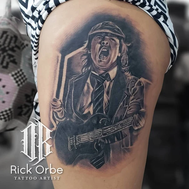 Realism Musician, Guitar tattoo on Thigh