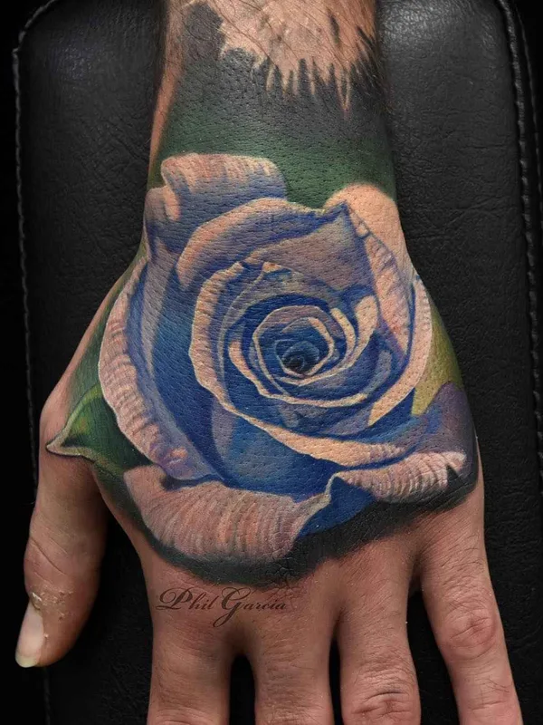 color realism 纹身 在 hand #2680 | 纹身师 Phil Garcia