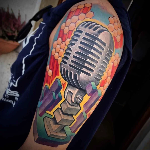 Realism Microphone tattoo on Upper Arm