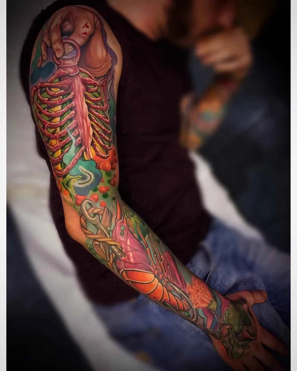 Biomechanical Ribcage, Lobster tattoo on Full Sleeve