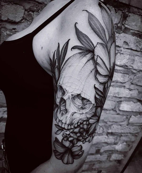 Black & Grey Skull, Botanic tattoo on Upper Arm