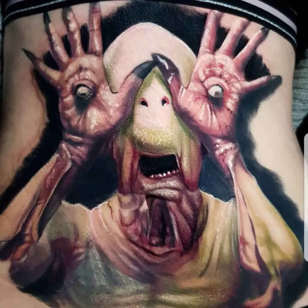 Tattoo artist Alex Wright color realistic horror tattoo