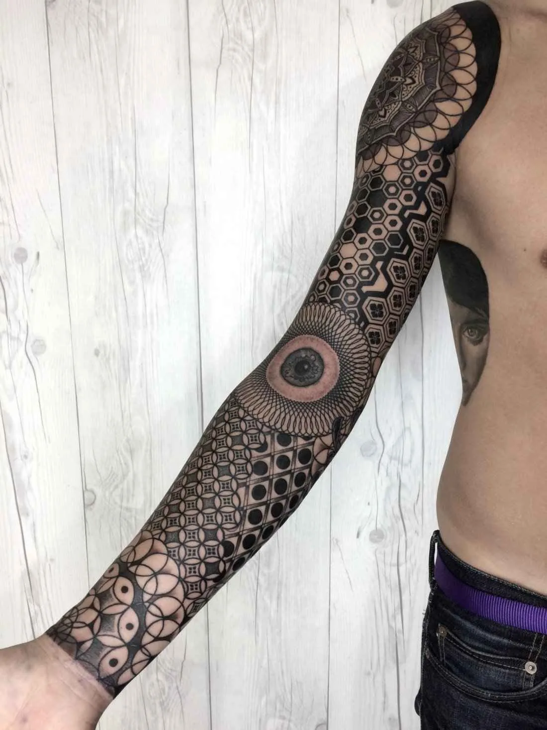 tattoo artist Nicasso ornamental graphic tattoo