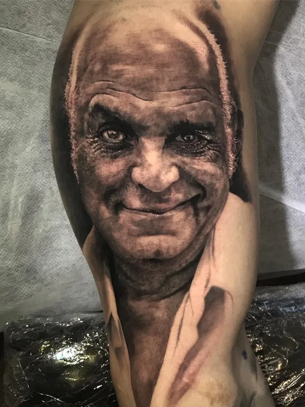 black and grey realism 纹身 在 calf #25147 | 纹身师 Chris Mata'afa