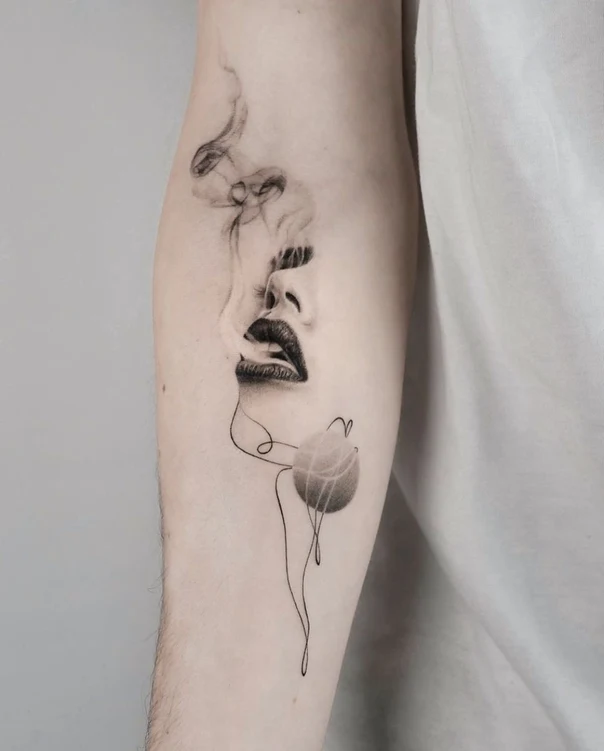 Fineline Face, Smoke tattoo on Forearm