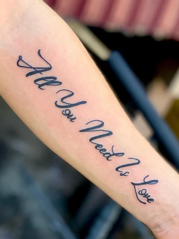 black lettering tatuaje en forearm #42152 | Tatuador Владислав Бондаренко