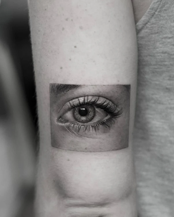 Realism Eye tattoo on Upper Arm