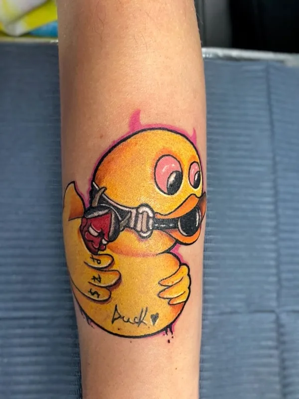 color cartoon tattoo auf forearm #42609 | Tätowierer Захаров Сергей 