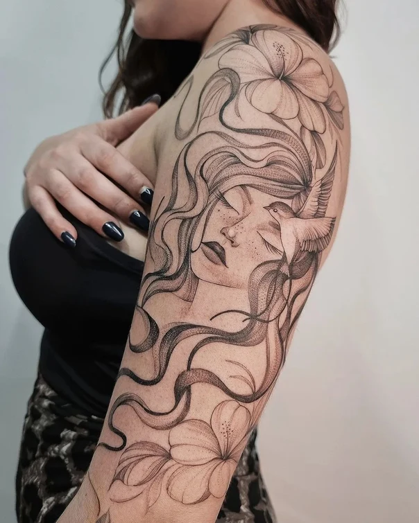 Fineline Woman, Bird tattoo on Full Sleeve