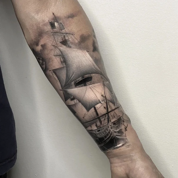 Realism Ship tattoo on Forearm