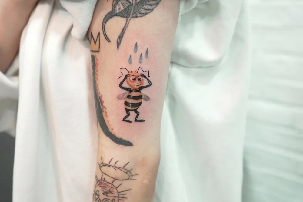 Tatuaggio a colori miniaturizzato eseguito da Sodam