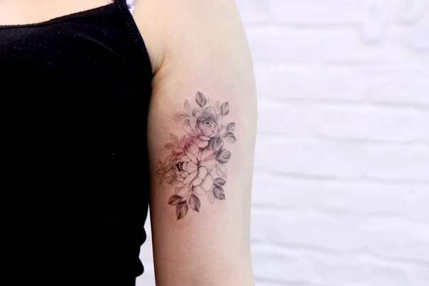 Fineline Flowers, Leaves tattoo on Upper Arm