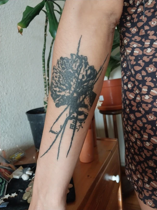 Blackwork Flower, Calligraphy tattoo on Forearm