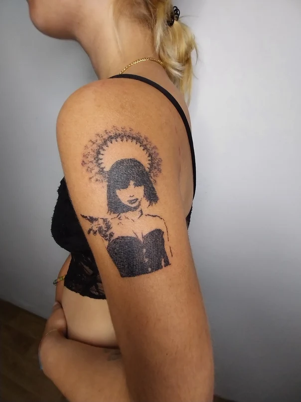 Blackwork Portrait tattoo on Upper Arm