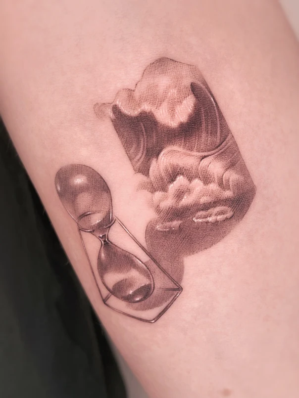 Black & Grey Hourglass, Clouds tattoo on Forearm