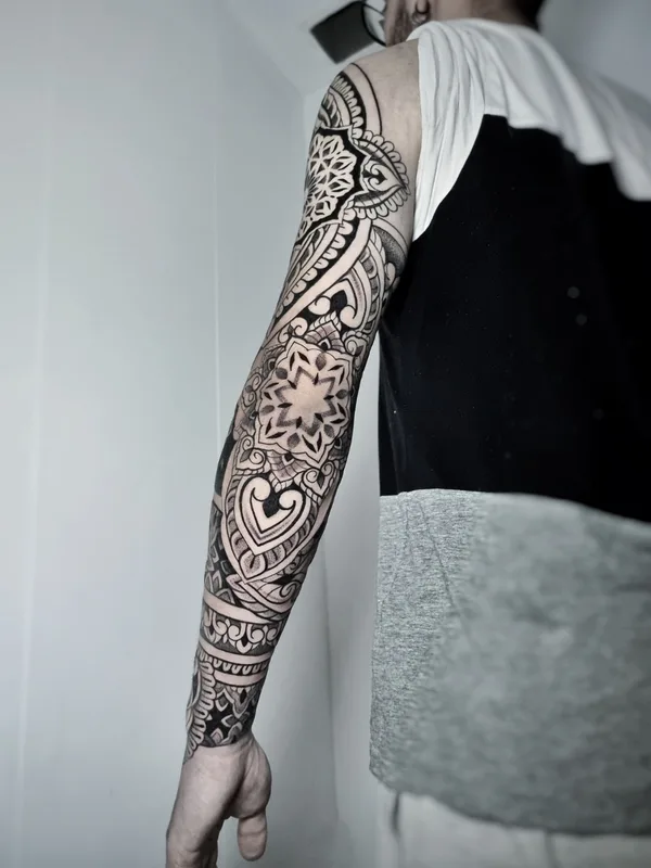 black ornamental tattoo on full sleeve #74138 | Tattoo Artist Sharin Tattoo