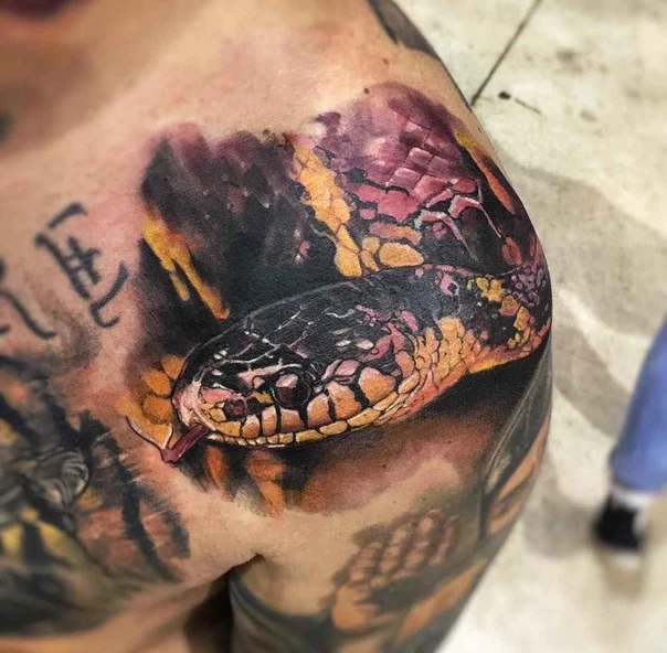 Realism Snake tattoo on Shoulder