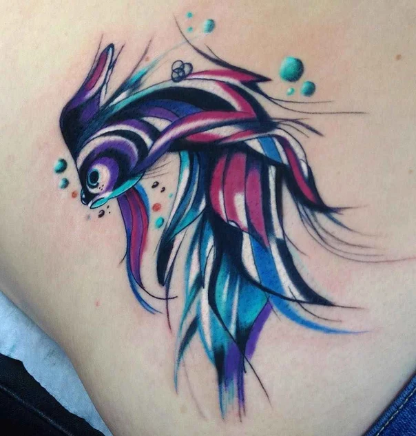 Abstract Fish tattoo on Shoulder Blade