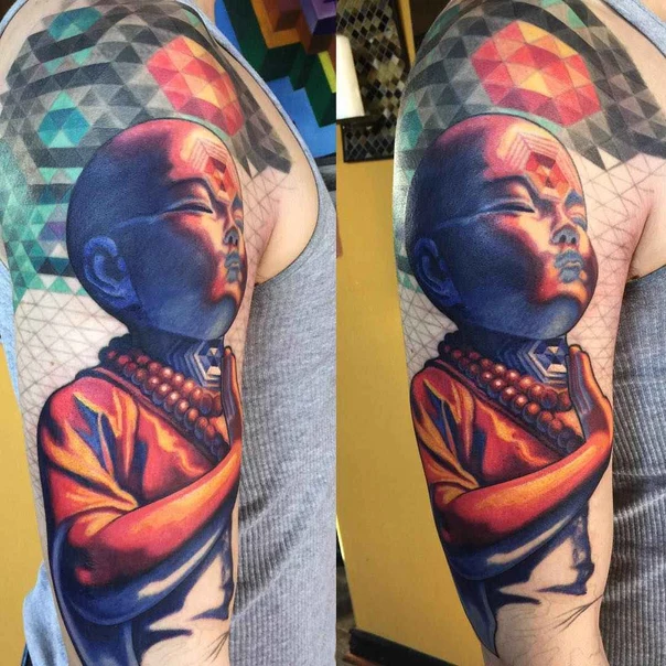 Realism Buddha, Geometric tattoo on Upper Arm