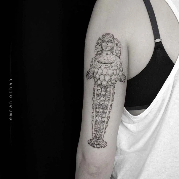 Blackwork Figure, Statue tattoo on Upper Arm
