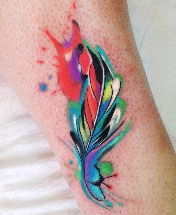 Watercolor Feather tattoo on Calf